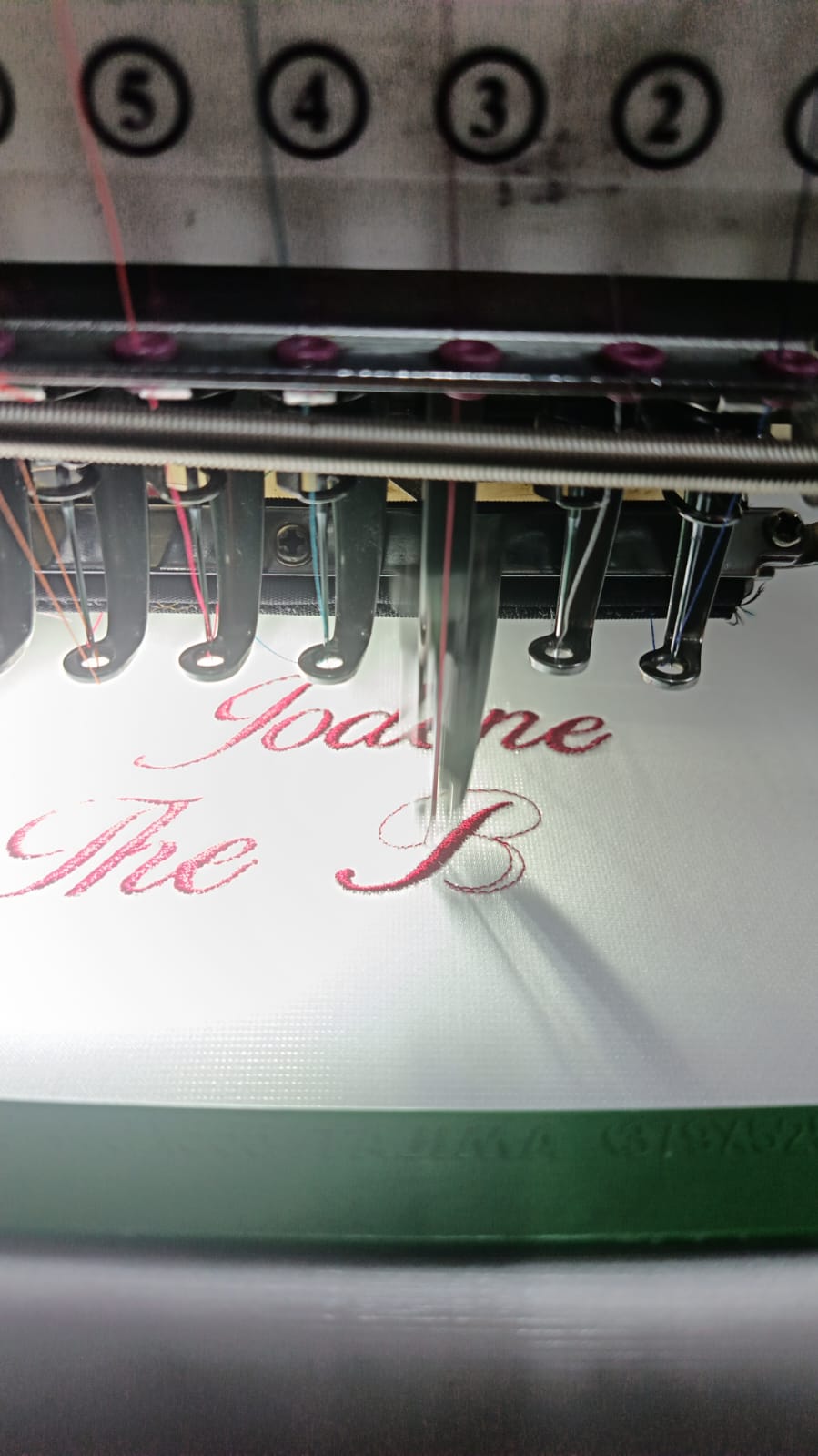 Script Embroidery Close-Up